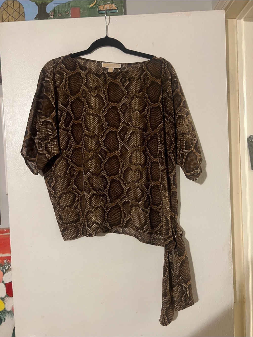 Michael Kors short sleeve snakeskin pattern top. Side tie